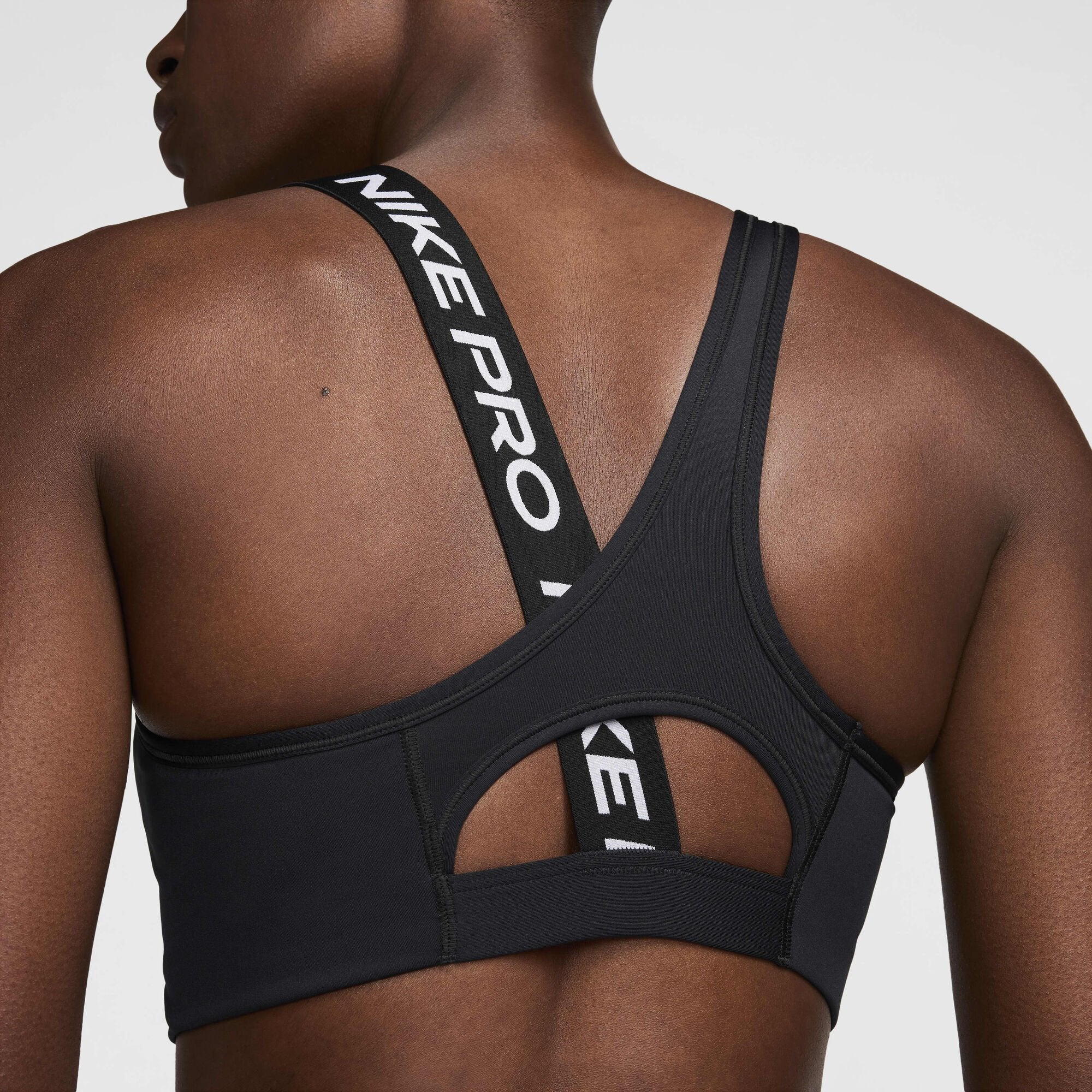 Дамско бюстие Nike Pro Swoosh Asymmetrical Sports Bra - Airhouse
