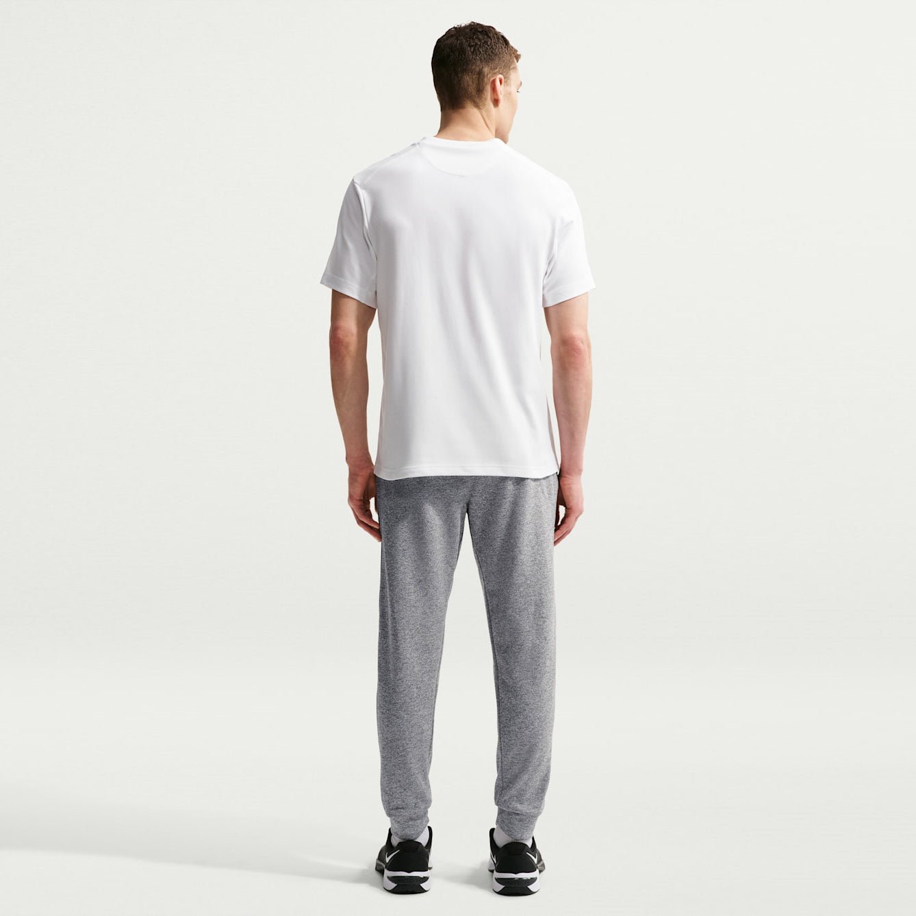 Мъжка тениска Nike Primary Dri-FIT Short-Sleeve Versatile Top - DV9831-100 модел отзад