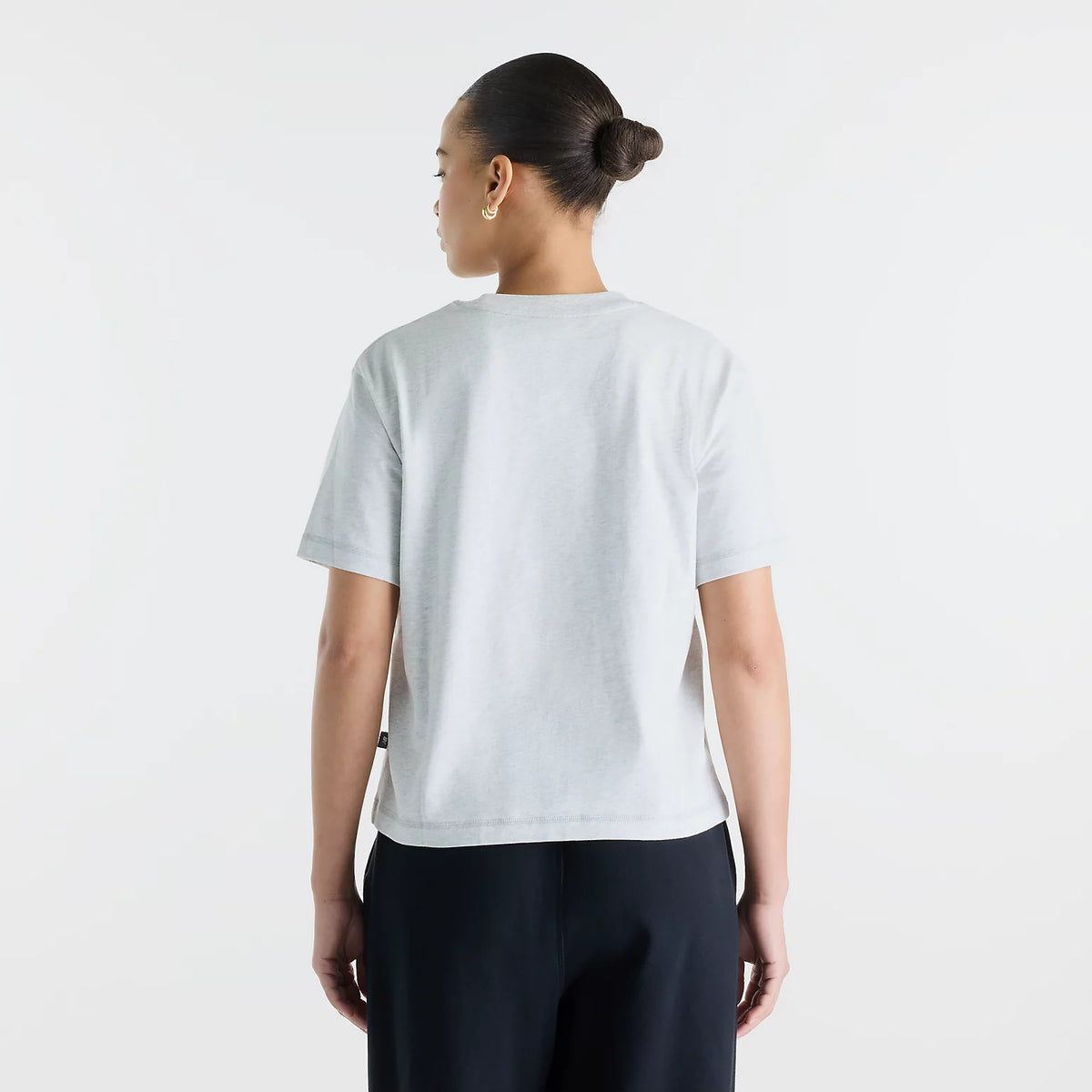 Дамска тениска New Balance Varsity Scholar Relaxed Hip T-Shirt - WT62K2W4AHH отзад