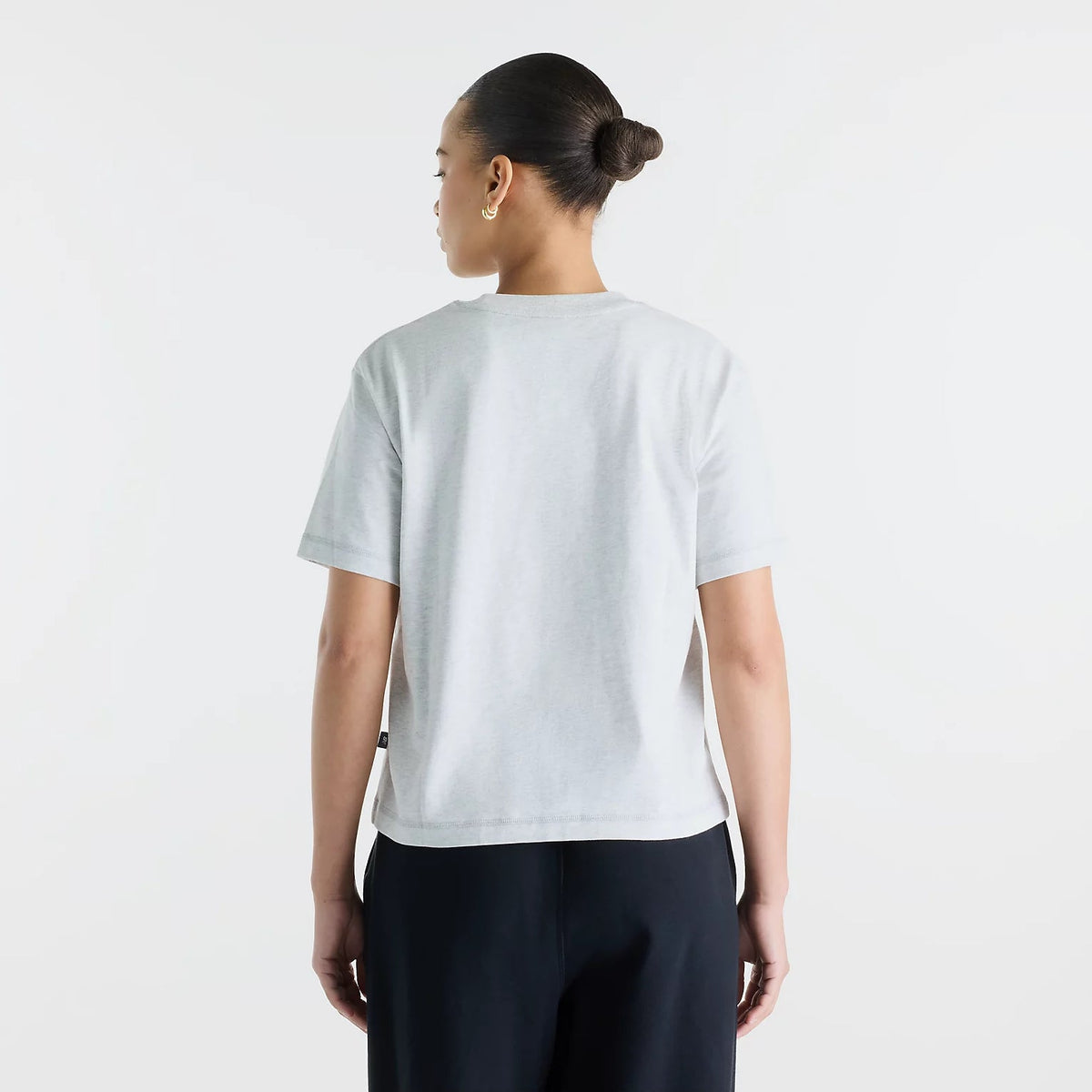 Дамска тениска New Balance Varsity Scholar Relaxed Hip T-Shirt - WT62K2W4AHH отзад