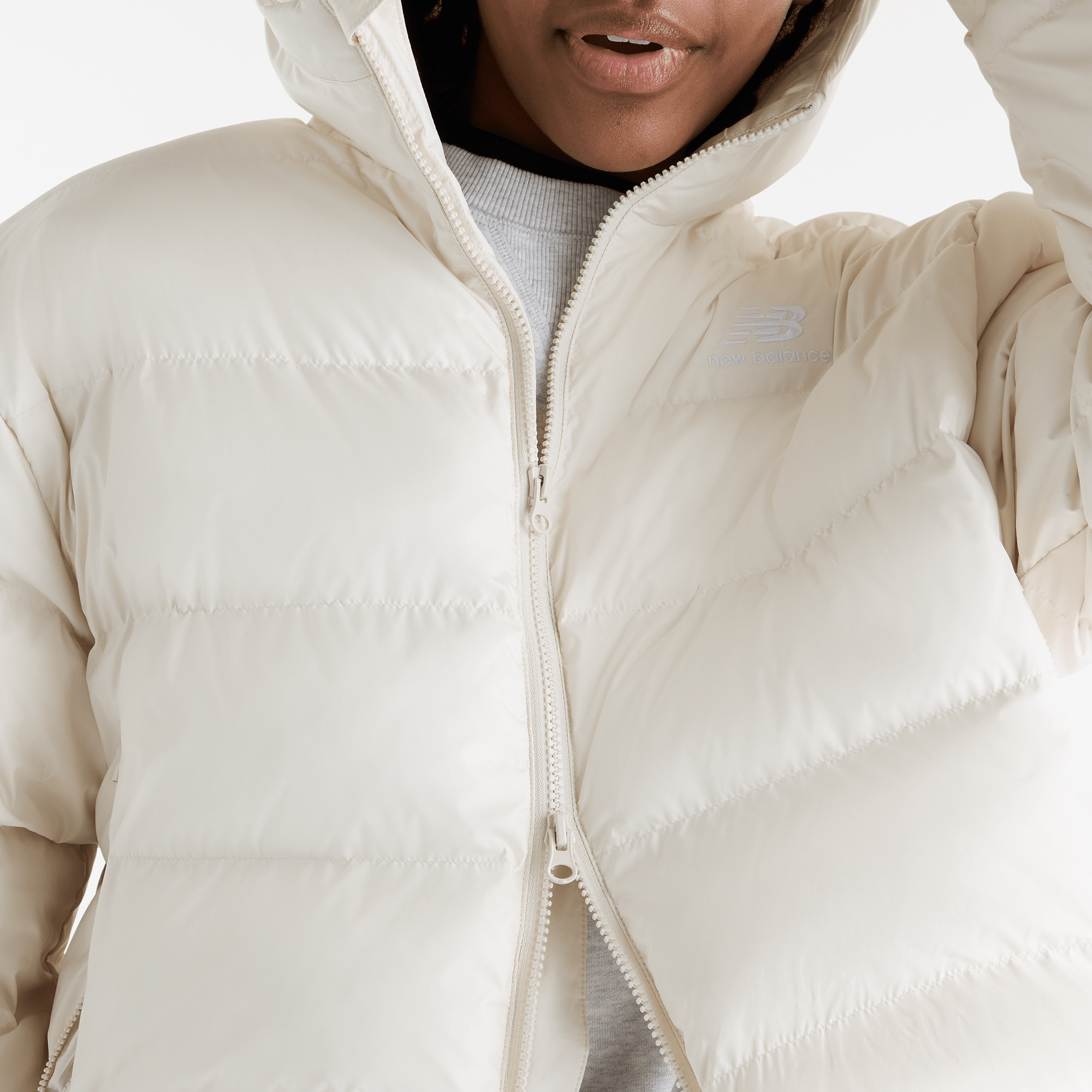 Дамско яке New Balance Boston Puffer Jacket - WJ62V5SNLIN детайл цип
