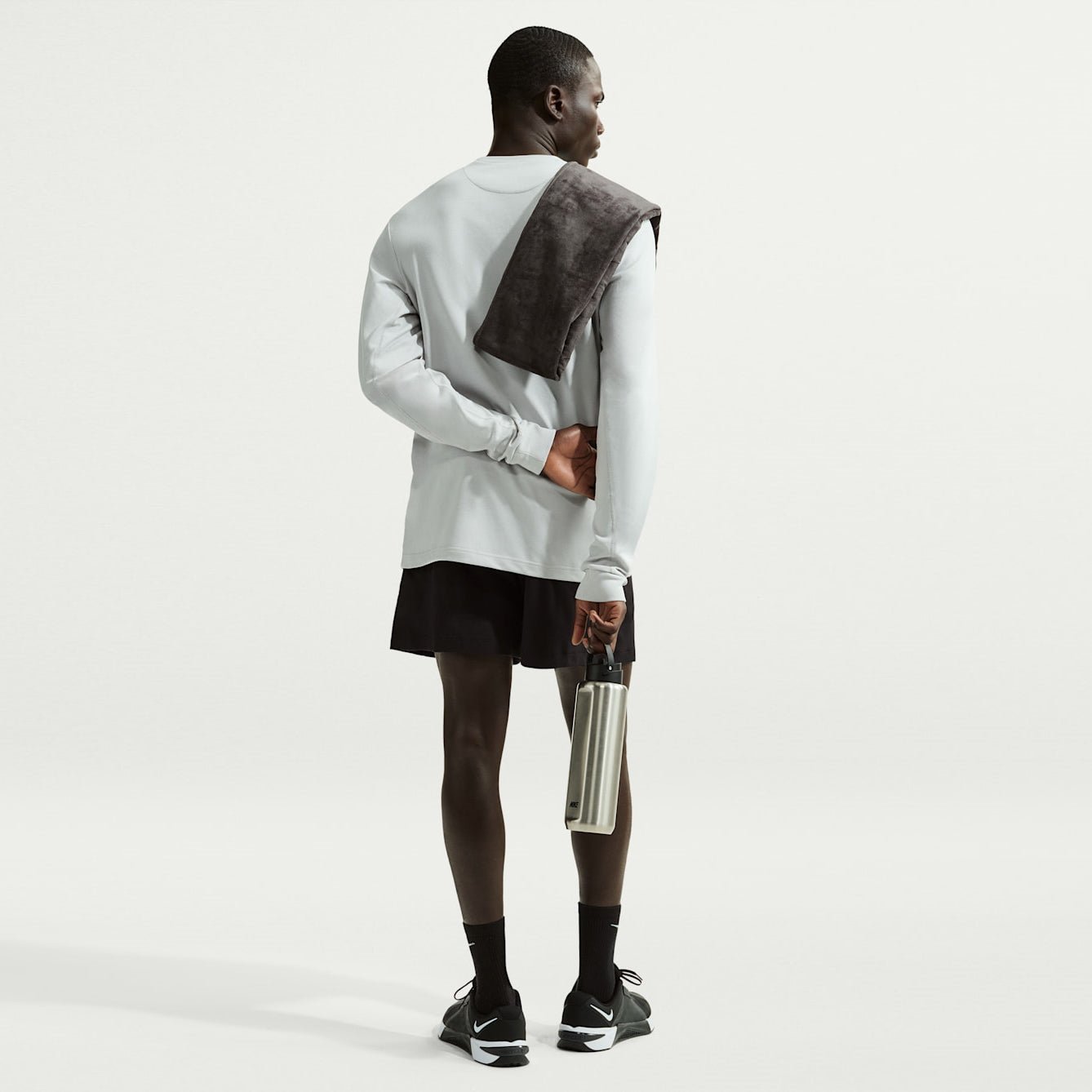 Мъжки къс панталон Nike Primary NanoKnit Dri-FIT Performance Shorts - II1310-010 модел отзад